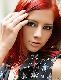 Redhead girl Ariel A has always dreamed of posing nude on the nature