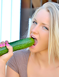 Staci has some fun with a cucumber today.