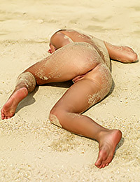 This is unusual sexy posing naked on the beach